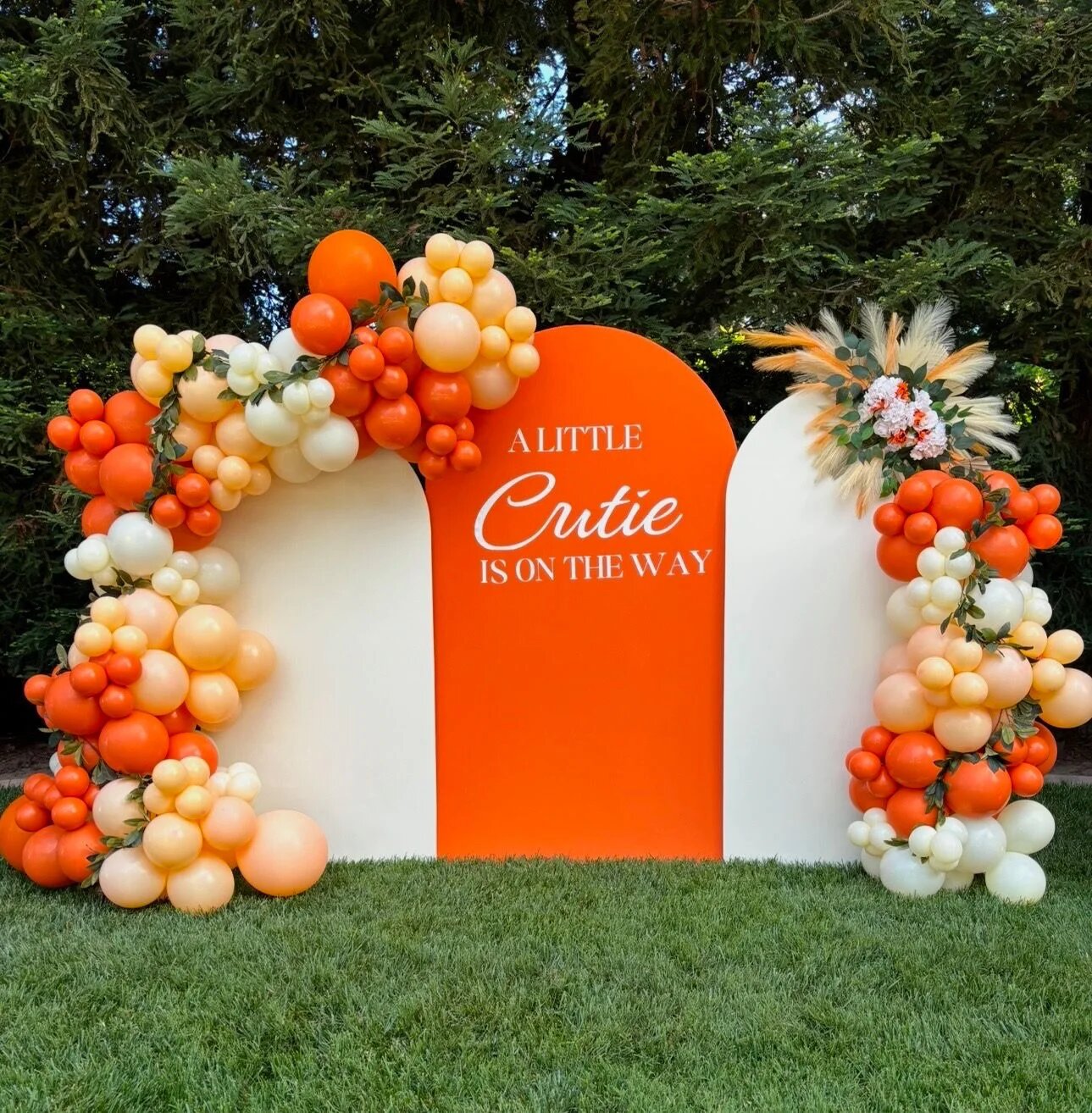 First Communion floral arch celebration