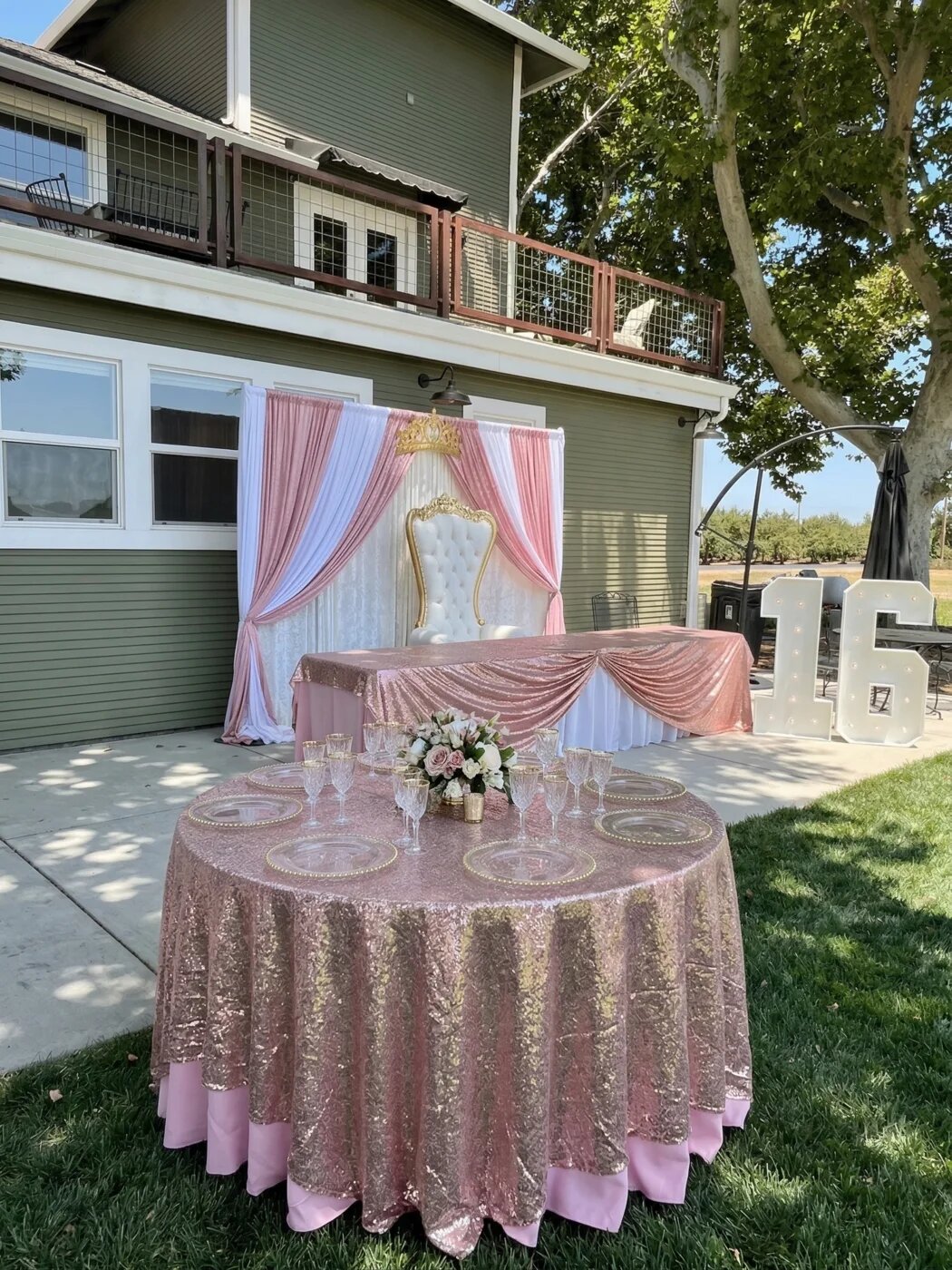 Outdoor canopy setup with decorated tables